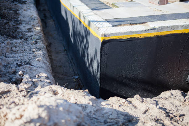 Professional Waterproofing technician working in Logansport, IN